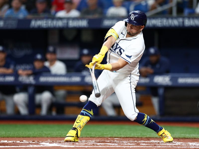 Sep 19, 2024; St. Petersburg, Florida, USA; Tampa Bay Rays first baseman Jonathan Aranda (62) breaks his bat on a ground ball against the Boston Red Sox in the first inning at Tropicana Field. Mandatory Credit: Nathan Ray Seebeck-Imagn Images