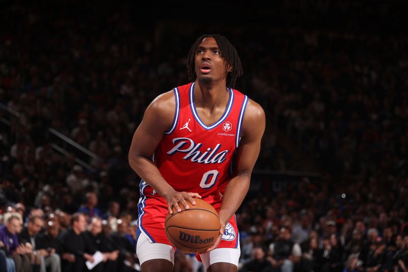 NEW YORK, NY - APRIL 20:  Tyrese Maxey #0 of the Philadelphia 76ers shoots a free throw during the game against the New York Knicks during Round 1 Game 1 of the 2024 NBA Playoffs on April 20, 2024 at Madison Square Garden in New York City, New York.  NOTE TO USER: User expressly acknowledges and agrees that, by downloading and or using this photograph, User is consenting to the terms and conditions of the Getty Images License Agreement. Mandatory Copyright Notice: Copyright 2024 NBAE  (Photo by Nathaniel S. Butler/NBAE via Getty Images)