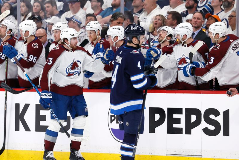 Apr 30, 2024; Winnipeg, Manitoba, CAN; Colorado Avalanche center Yakov Trenin (73) celebrates his second period goal against the Winnipeg Jets in game five of the first round of the 2024 Stanley Cup Playoffs at Canada Life Centre. Mandatory Credit: James Carey Lauder-USA TODAY Sports