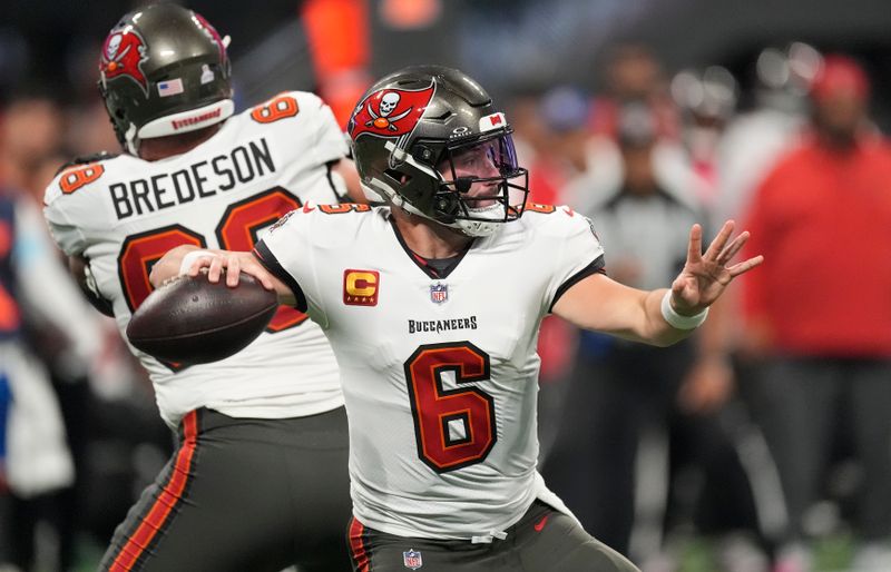 Tampa Bay Buccaneers quarterback Baker Mayfield (6) throws a pass against the Atlanta Falcons during the first half of an NFL football game Thursday, Oct. 3, 2024, in Atlanta. (AP Photo/John Bazemore)