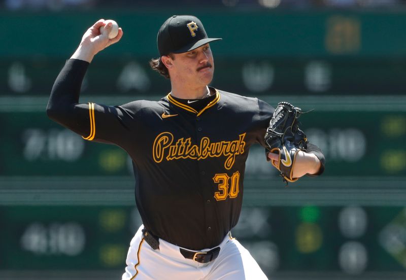 Aug 28, 2024; Pittsburgh, Pennsylvania, USA;  Pittsburgh Pirates starting pitcher Paul Skenes (30) delivers a pitch against the Chicago Cubs during the first inning at PNC Park. Mandatory Credit: Charles LeClaire-USA TODAY Sports