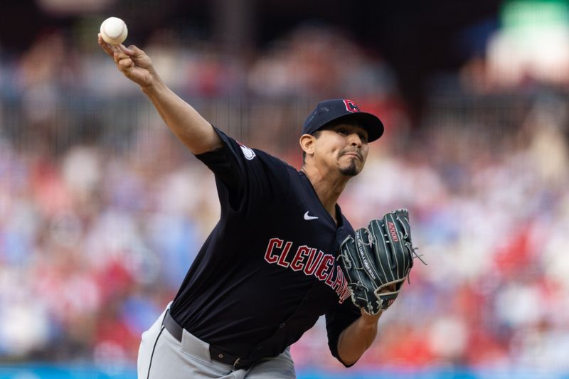 Jul 27, 2024; Philadelphia, Pennsylvania, USA;  Cleveland Guardians pitcher Carlos Carrasco (59) throws a pitch during the first inning against the Philadelphia Phillies at Citizens Bank Park. Mandatory Credit: Bill Streicher-USA TODAY Sports