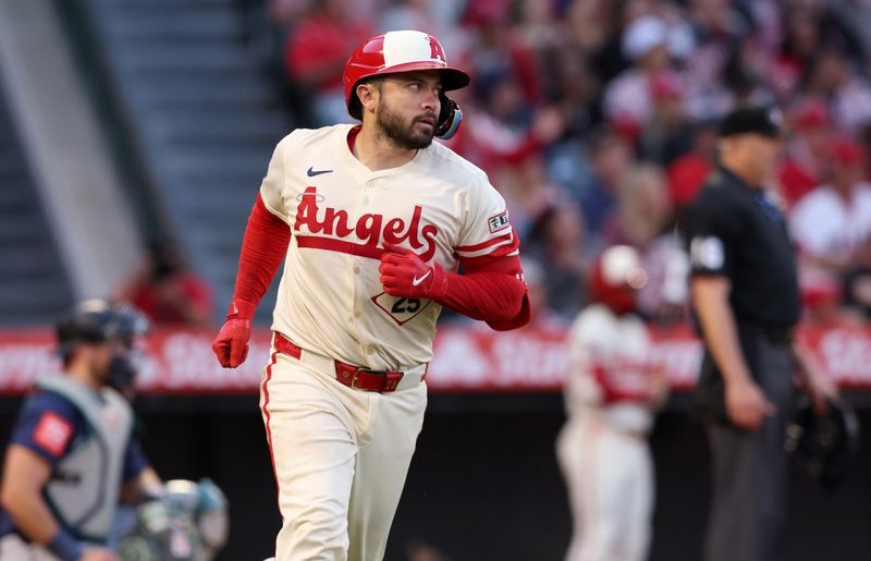 Jun 6, 2025; Anaheim, California, USA; Los Angeles Angels catcher Travis d'Arnaud (25) reacts after hitting a home run during the fourth inning against the Seattle Mariners at Angel Stadium. Mandatory Credit: Jason Parkhurst-Imagn Images