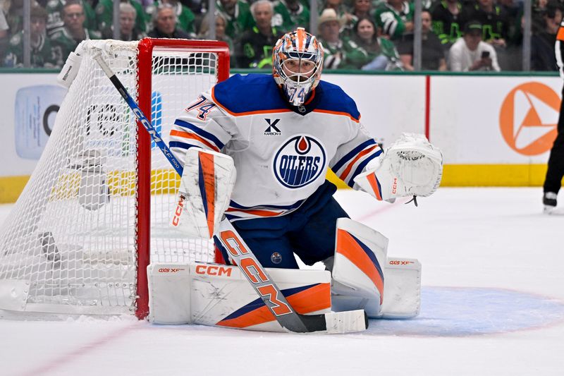 May 23, 2025; Dallas, Texas, USA; Edmonton Oilers goaltender Stuart Skinner (74) faces the Dallas Stars attack during the second period in game two of the Western Conference Final of the 2025 Stanley Cup Playoffs at American Airlines Center. Mandatory Credit: Jerome Miron-Imagn Images
