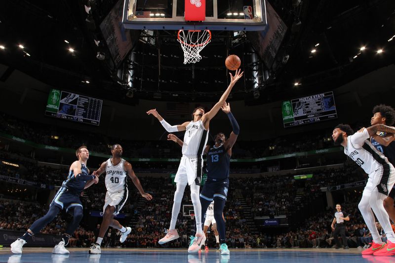 MEMPHIS, TN - FEBRUARY 3:  Victor Wembanyama #1 of the San Antonio Spurs rebounds the ball during the game against the Memphis Grizzlies on February 3, 2025 at FedExForum in Memphis, Tennessee. NOTE TO USER: User expressly acknowledges and agrees that, by downloading and or using this photograph, User is consenting to the terms and conditions of the Getty Images License Agreement. Mandatory Copyright Notice: Copyright 2025 NBAE (Photo by Joe Murphy/NBAE via Getty Images)