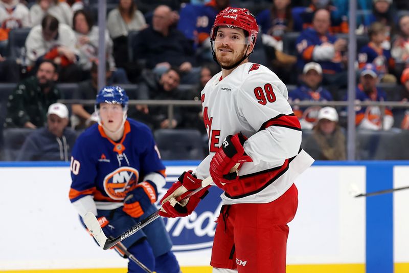 Jan 25, 2025; Elmont, New York, USA; Carolina Hurricanes center Jack Roslovic (98) reacts during the second period against the New York Islanders at UBS Arena. Mandatory Credit: Brad Penner-Imagn Images