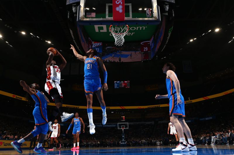 OKLAHOMA CITY, OK - MARCH 8:  Jimmy Butler #22 of the Miami Heat drives to the basket during the game against the Oklahoma City Thunder on March 8, 2024 at Paycom Arena in Oklahoma City, Oklahoma. NOTE TO USER: User expressly acknowledges and agrees that, by downloading and or using this photograph, User is consenting to the terms and conditions of the Getty Images License Agreement. Mandatory Copyright Notice: Copyright 2024 NBAE (Photo by Zach Beeker/NBAE via Getty Images)