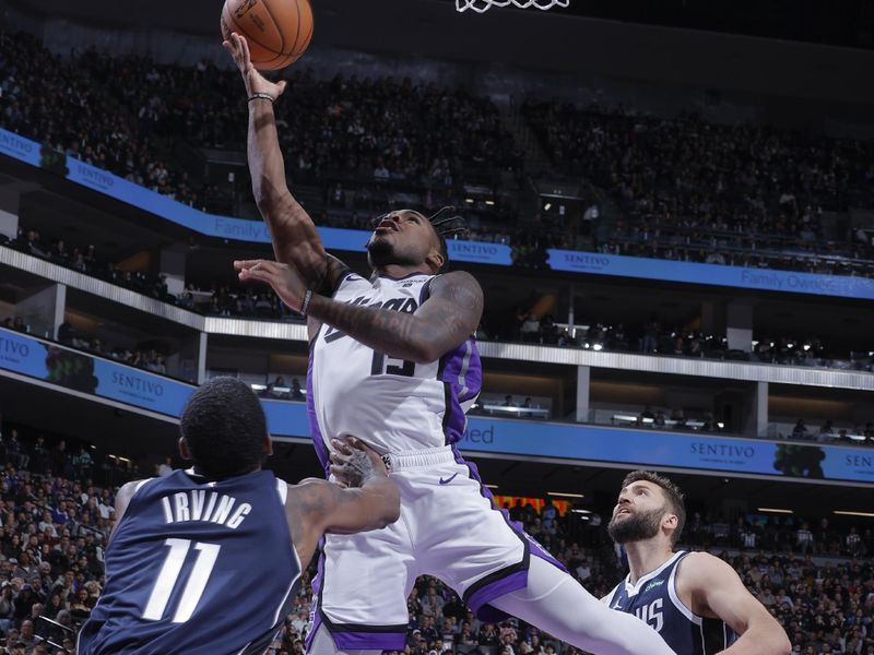 SACRAMENTO, CA - MARCH 29:  Davion Mitchell #15 of the Sacramento Kings goes to the basket during the game on March 29, 2024 at Golden 1 Center in Sacramento, California. NOTE TO USER: User expressly acknowledges and agrees that, by downloading and or using this Photograph, user is consenting to the terms and conditions of the Getty Images License Agreement. Mandatory Copyright Notice: Copyright 2024 NBAE (Photo by Rocky Widner/NBAE via Getty Images)