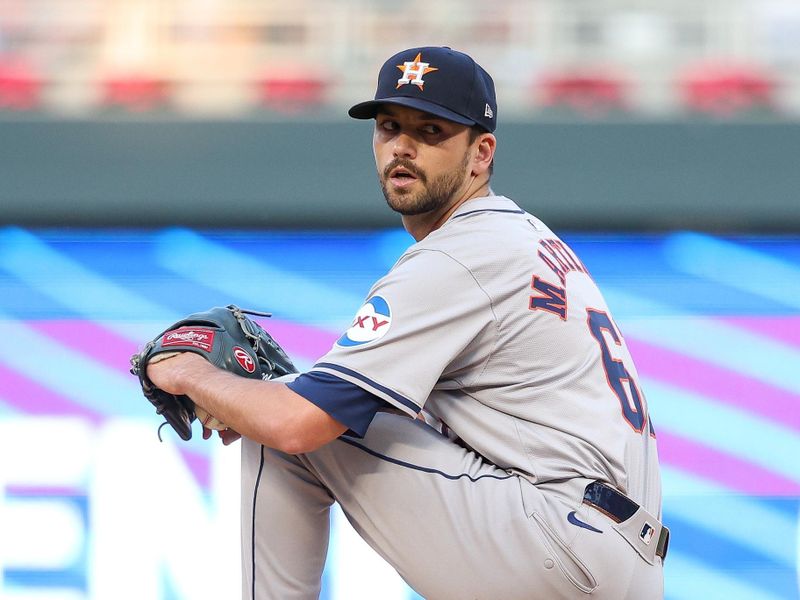 Jul 5, 2024; Minneapolis, Minnesota, USA; Houston Astros pitcher Seth Martinez (61) pitches against the Minnesota Twins during the third inning at Target Field. Mandatory Credit: Matt Krohn-USA TODAY Sports