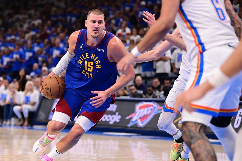 OKLAHOMA CITY, OKLAHOMA - MAY 13: Nikola Jokic #15 of the Denver Nuggets drives during the second half of game five of the Western Conference semifinals against the Oklahoma City Thunder at Paycom Center on May 13, 2025 in Oklahoma City, Oklahoma. NOTE TO USER: User expressly acknowledges and agrees that, by downloading and or using this photograph, User is consenting to the terms and conditions of the Getty Images License Agreement. (Photo by Joshua Gateley/Getty Images)