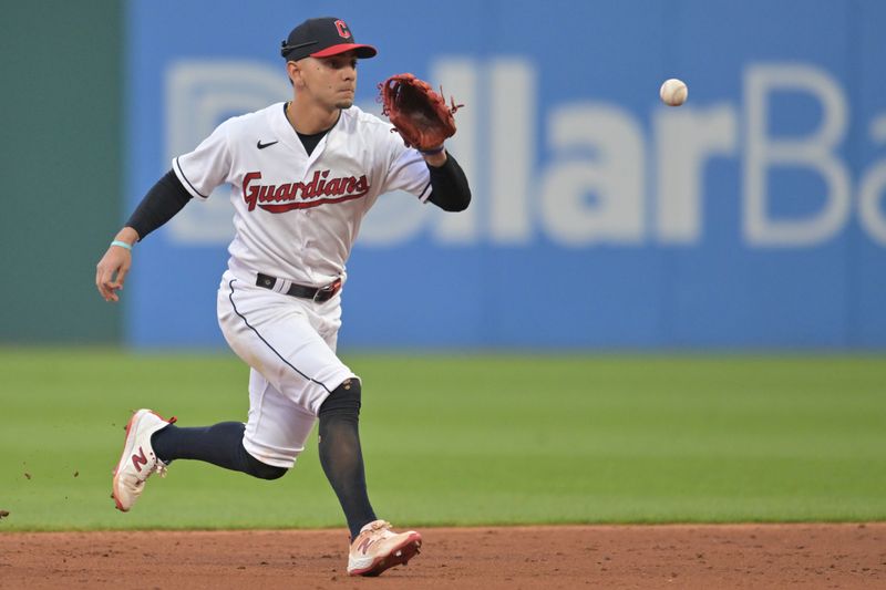 May 26, 2023; Cleveland, Ohio, USA; Cleveland Guardians second baseman Andres Gimenez (0) fields a ball hit by St. Louis Cardinals catcher Willson Contreras (40) during the sixth inning at Progressive Field. Mandatory Credit: Ken Blaze-USA TODAY Sports