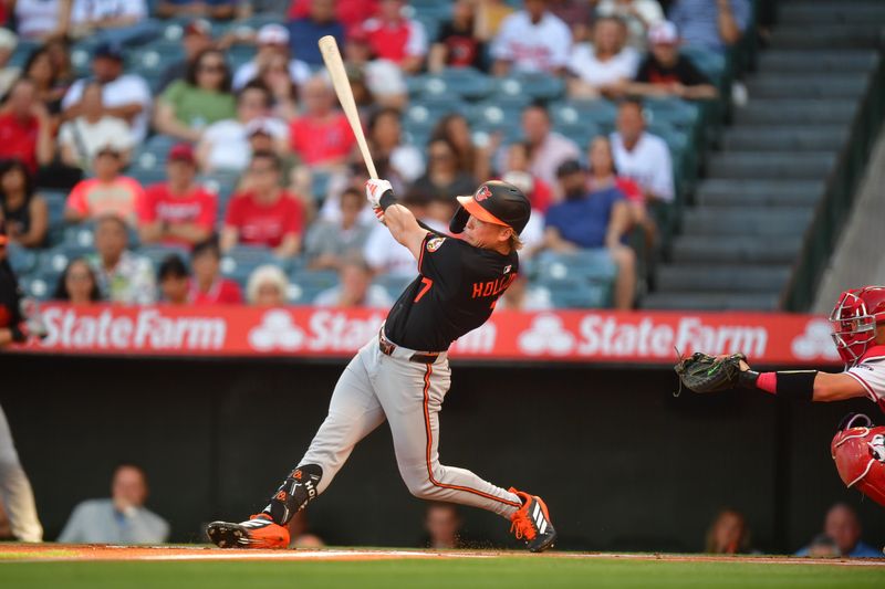 May 10, 2025; Anaheim, California, USA; Baltimore Orioles second baseman Jackson Holliday (7) hits a single against the Los Angeles Angels during the first inning at Angel Stadium. Mandatory Credit: Gary A. Vasquez-Imagn Images