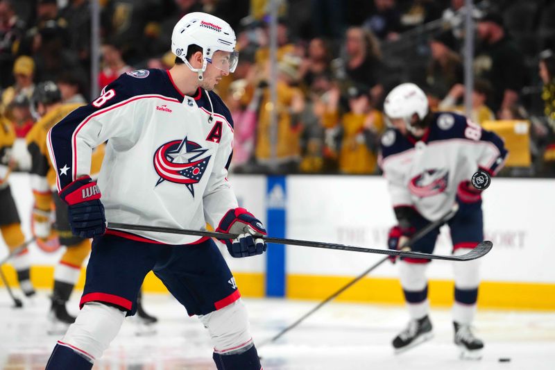 Mar 23, 2024; Las Vegas, Nevada, USA; Columbus Blue Jackets defenseman Zach Werenski (8) warms up before a game against the Vegas Golden Knights at T-Mobile Arena. Mandatory Credit: Stephen R. Sylvanie-USA TODAY Sports