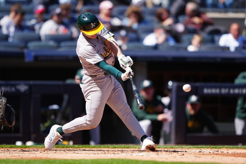 Apr 22, 2024; Bronx, New York, USA; Oakland Athletics shortstop Nick Allen (10) hits a single against the New York Yankees during the fifth inning at Yankee Stadium. Mandatory Credit: Gregory Fisher-USA TODAY Sports