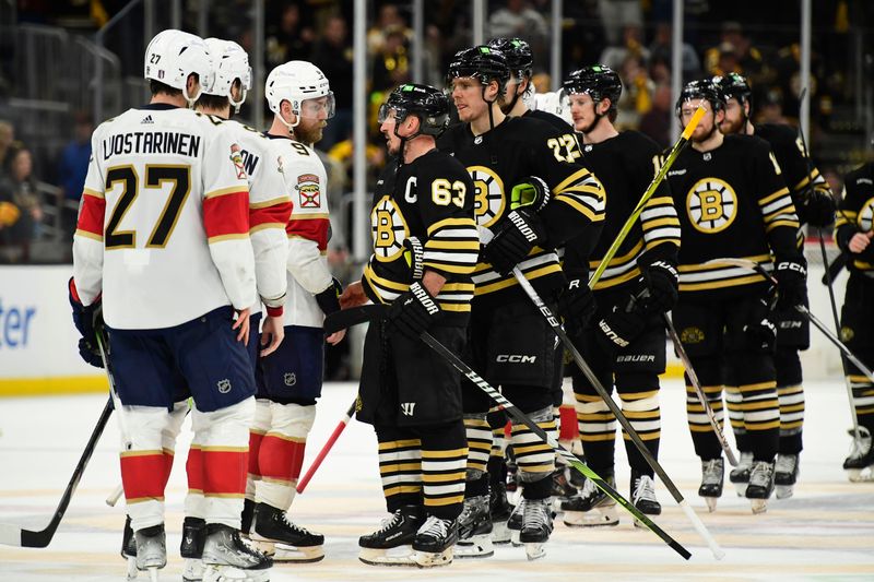 May 17, 2024; Boston, Massachusetts, USA; Florida Panthers center Sam Bennett (9) and Boston Bruins left wing Brad Marchand (63) speak after the Panthers defeated the Bruins in game six of the second round of the 2024 Stanley Cup Playoffs at TD Garden. Mandatory Credit: Bob DeChiara-USA TODAY Sports