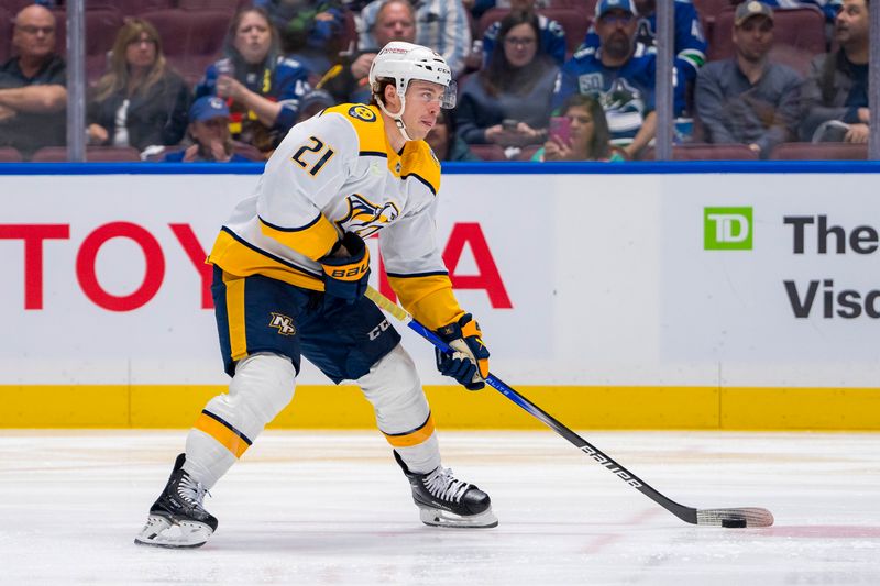 Apr 23, 2024; Vancouver, British Columbia, CAN; Nashville Predators forward Anthony Beauvillier (21) handles the puck against the Vancouver Canucks during the second period in game two of the first round of the 2024 Stanley Cup Playoffs at Rogers Arena. Mandatory Credit: Bob Frid-USA TODAY Sports