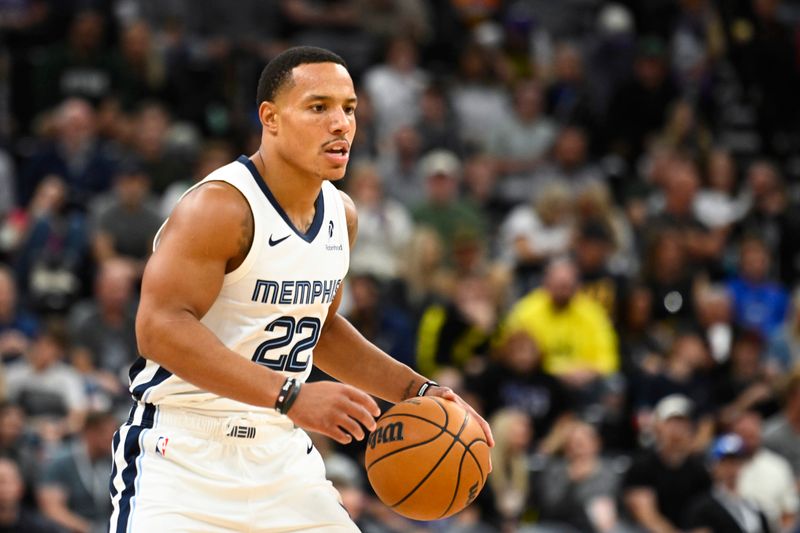 SALT LAKE CITY, UTAH - OCTOBER 23: Desmond Bane #22 of the Memphis Grizzlies dribbles the ball against the Utah Jazz during the third quarter at Delta Center on October 23, 2024 in Salt Lake City, Utah. NOTE TO USER: User expressly acknowledges and agrees that, by downloading and or using this photograph, User is consenting to the terms and conditions of the Getty Images License Agreement. (Photo by Alex Goodlett/Getty Images)