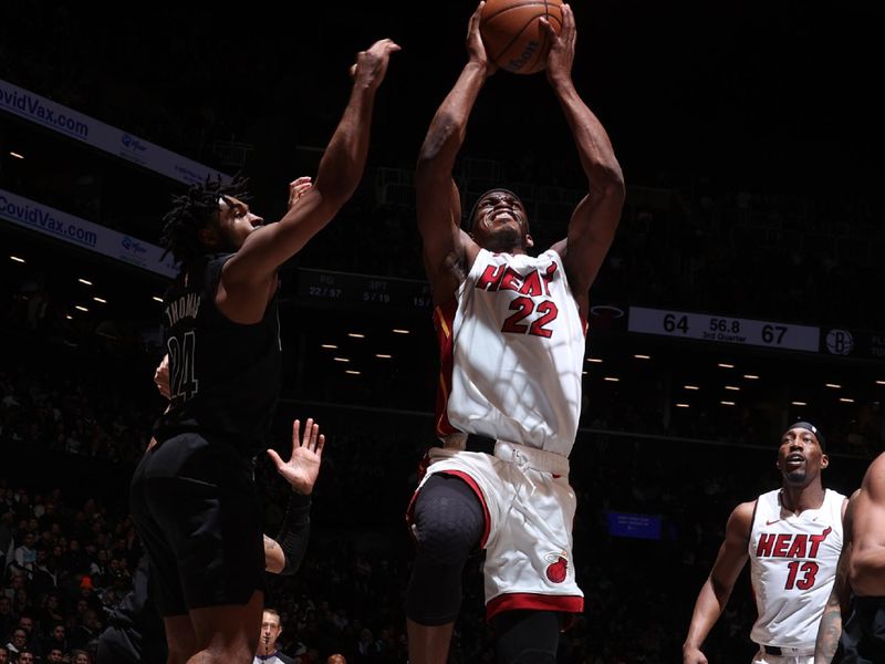 BROOKLYN, NY - JANUARY 15: Jimmy Butler #22 of the Miami Heat drives to the basket during the game against the Brooklyn Nets on January 15, 2024 at Barclays Center in Brooklyn, New York. NOTE TO USER: User expressly acknowledges and agrees that, by downloading and or using this Photograph, user is consenting to the terms and conditions of the Getty Images License Agreement. Mandatory Copyright Notice: Copyright 2024 NBAE (Photo by Nathaniel S. Butler/NBAE via Getty Images)