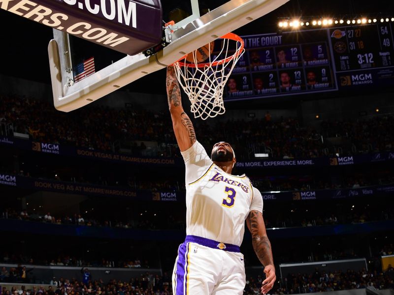 LOS ANGELES, CA - NOVEMBER 23: Anthony Davis #3 of the Los Angeles Lakers drives to the basket during the game against the Denver Nuggets on November 23, 2024 at Crypto.Com Arena in Los Angeles, California. NOTE TO USER: User expressly acknowledges and agrees that, by downloading and/or using this Photograph, user is consenting to the terms and conditions of the Getty Images License Agreement. Mandatory Copyright Notice: Copyright 2024 NBAE (Photo by Adam Pantozzi/NBAE via Getty Images)