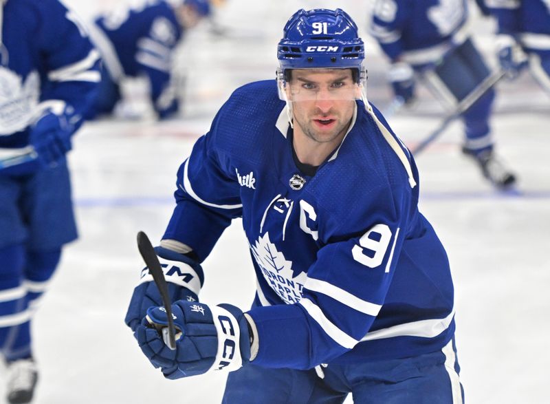 Jan 3, 2023; Toronto, Ontario, CAN; Toronto Maple Leafs forward John Tavares (91) warms up before playing the St. Louis Blues at Scotiabank Arena. Mandatory Credit: Dan Hamilton-USA TODAY Sports