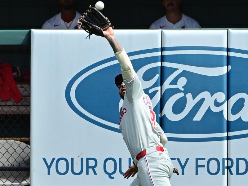 Apr 13, 2025; St. Louis, Missouri, USA; Philadelphia Phillies outfielder Nick Castellanos (8) makes the catch in right field for the out against St. Louis Cardinals outfielder Lars Nootbaar (21,not shown) in the fifth inning at Busch Stadium. Mandatory Credit: Tim Vizer-Imagn Images