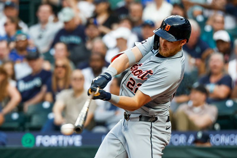 Aug 8, 2024; Seattle, Washington, USA; Detroit Tigers center fielder Parker Meadows (22) hits an RBI-double against the Seattle Mariners during the fifth inning at T-Mobile Park. Mandatory Credit: Joe Nicholson-USA TODAY Sports