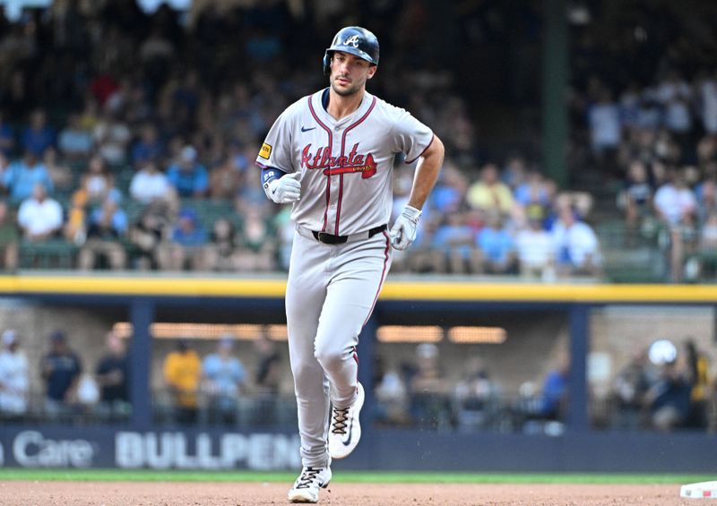 Jul 31, 2024; Milwaukee, Wisconsin, USA; Atlanta Braves first baseman Matt Olson (28) rounds the bases after hitting a home run against the Milwaukee Brewers in the seventh inning at American Family Field. Mandatory Credit: Michael McLoone-USA TODAY Sports