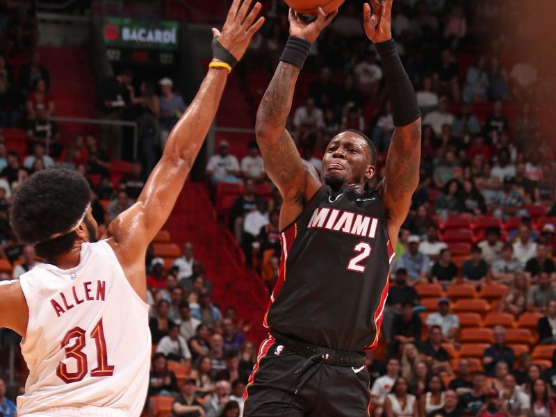 MIAMI, FL - MARCH 24: Terry Rozier #2 of the Miami Heat shoots the ball during the game against the Cleveland Cavaliers on March 24, 2024 at Kaseya Center in Miami, Florida. NOTE TO USER: User expressly acknowledges and agrees that, by downloading and or using this Photograph, user is consenting to the terms and conditions of the Getty Images License Agreement. Mandatory Copyright Notice: Copyright 2024 NBAE (Photo by Issac Baldizon/NBAE via Getty Images)