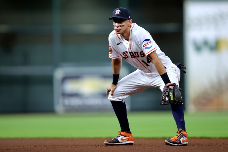 May 2, 2023; Houston, Texas, USA; Houston Astros second baseman Mauricio Dubon (14) in the infield against the San Francisco Giants during the fourth inning at Minute Maid Park. Mandatory Credit: Erik Williams-USA TODAY Sports