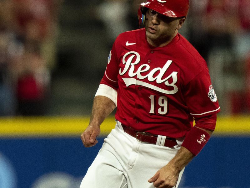 Sep 23, 2023; Cincinnati, Ohio, USA; Cincinnati Reds first baseman Joey Votto (19) heads to third base on a center fielder TJ Friedl (29) double in the ninth inning against the Pittsburgh Pirates at Great American Ball Park. Mandatory Credit: The Cincinnati Enquirer-USA TODAY Sports