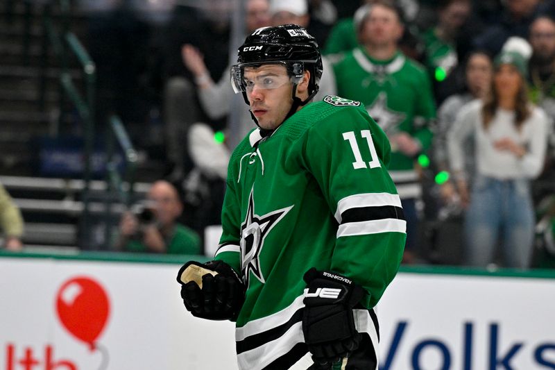 Apr 22, 2024; Dallas, Texas, USA; Dallas Stars center Logan Stankoven (11) checks for blood after getting hit with a hight stick by the Vegas Golden Knights during the second period in game one of the first round of the 2024 Stanley Cup Playoffs at the American Airlines Center. Mandatory Credit: Jerome Miron-USA TODAY Sports