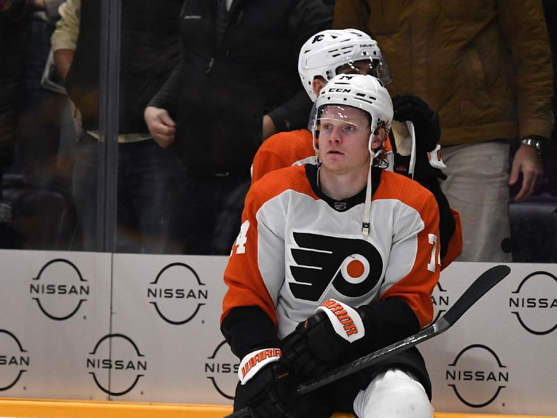 Dec 12, 2023; Nashville, Tennessee, USA; Philadelphia Flyers right wing Owen Tippett (74) reacts after losing in overtime against the Nashville Predators at Bridgestone Arena. Mandatory Credit: Christopher Hanewinckel-USA TODAY Sports