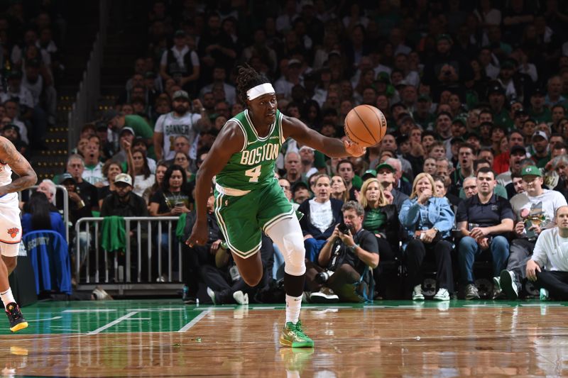 BOSTON, MA - OCTOBER 22: Jrue Holiday #4 of the Boston Celtics dribbles the ball during the game against the New York Knicks on October 22, 2024 at TD Garden in Boston, Massachusetts. NOTE TO USER: User expressly acknowledges and agrees that, by downloading and/or using this Photograph, user is consenting to the terms and conditions of the Getty Images License Agreement. Mandatory Copyright Notice: Copyright 2024 NBAE (Photo by Brian Babineau/NBAE via Getty Images)