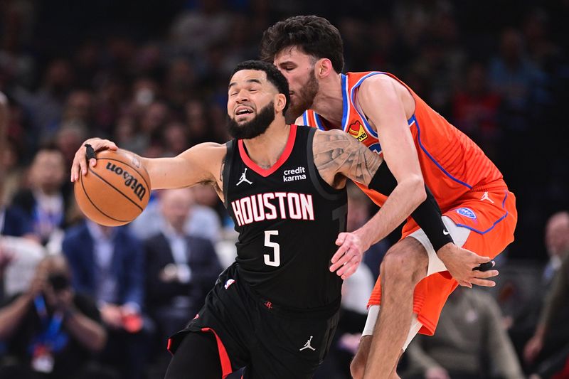 OKLAHOMA CITY, OKLAHOMA - MARCH 27: Fred VanVleet #5 of the Houston Rockets drives against Chet Holmgren #7 of the Oklahoma City Thunder during the first half at Paycom Center on March 27, 2024 in Oklahoma City, Oklahoma. NOTE TO USER: User expressly acknowledges and agrees that, by downloading and or using this Photograph, user is consenting to the terms and conditions of the Getty Images License Agreement. (Photo by Joshua Gateley/Getty Images)