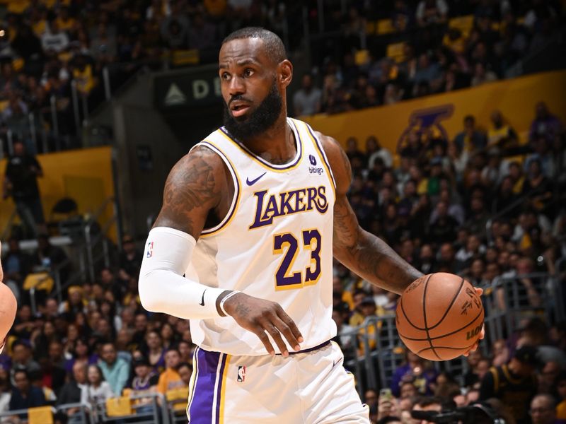 LOS ANGELES, CA - APRIL 27: LeBron James #23 of the Los Angeles Lakers dribbles the ball during the game against the Denver Nuggets during Round 1 Game 4 of the 2024 NBA Playoffs on April 27, 2024 at Crypto.Com Arena in Los Angeles, California. NOTE TO USER: User expressly acknowledges and agrees that, by downloading and/or using this Photograph, user is consenting to the terms and conditions of the Getty Images License Agreement. Mandatory Copyright Notice: Copyright 2024 NBAE (Photo by Andrew D. Bernstein/NBAE via Getty Images)