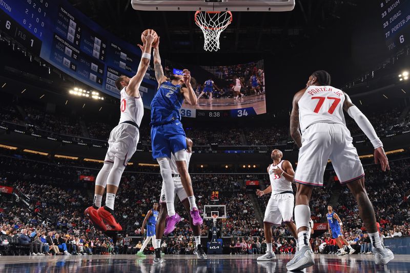 INGLEWOOD, CA - OCTOBER 14: Dereck Lively II #2 of the Dallas Mavericks and Ivica Zubac #40 of the LA Clippers battle for a rebound during the game on October 14, 2024 at Intuit Dome in Los Angeles, California. NOTE TO USER: User expressly acknowledges and agrees that, by downloading and/or using this Photograph, user is consenting to the terms and conditions of the Getty Images License Agreement. Mandatory Copyright Notice: Copyright 2024 NBAE (Photo by Juan Ocampo/NBAE via Getty Images)