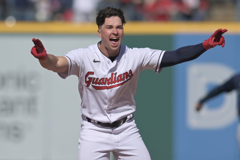 Apr 9, 2023; Cleveland, Ohio, USA; Cleveland Guardians right fielder Will Brennan (17) celebrates after hitting an RBI double during the ninth inning against the Seattle Mariners at Progressive Field. Mandatory Credit: Ken Blaze-USA TODAY Sports