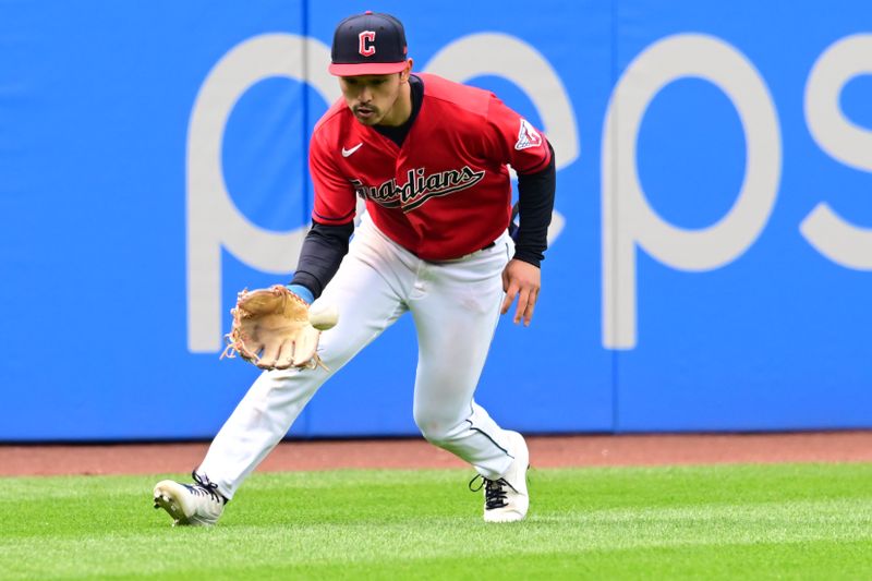 Apr 23, 2023; Cleveland, Ohio, USA; Cleveland Guardians left fielder Steven Kwan (38) fields a single hit by Miami Marlins right fielder Jorge Soler (not pictured) during the eighth inning at Progressive Field. Mandatory Credit: Ken Blaze-USA TODAY Sports