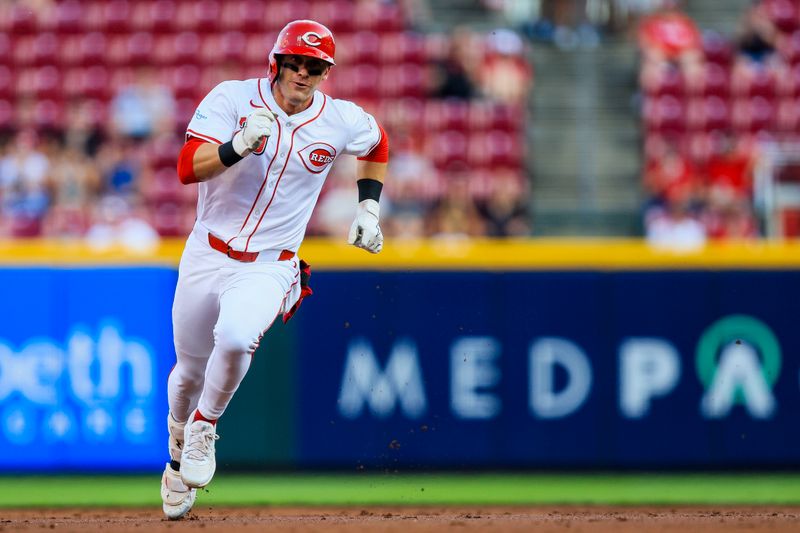 Aug 27, 2024; Cincinnati, Ohio, USA; Cincinnati Reds outfielder TJ Friedl (29) runs to third after hitting a triple in the second inning against the Oakland Athletics at Great American Ball Park. Mandatory Credit: Katie Stratman-USA TODAY Sports