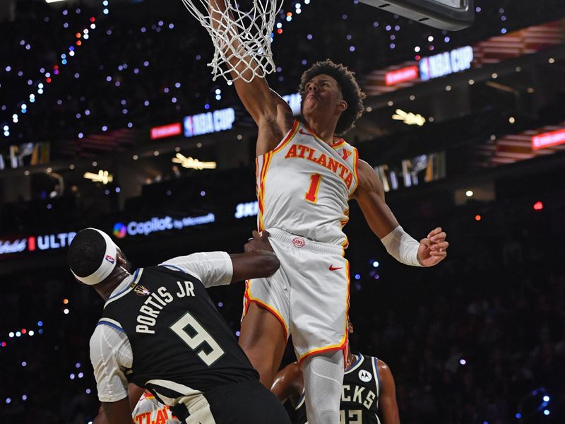 LAS VEGAS, NV - DECEMBER 14: Jalen Johnson #1 of the Atlanta Hawks dunks the ball during the game against the Milwaukee Bucks during the Emirates NBA Cup Semifinal game on December 14, 2024 at T-Mobile Arena in Las Vegas, Nevada. NOTE TO USER: User expressly acknowledges and agrees that, by downloading and/or using this Photograph, user is consenting to the terms and conditions of the Getty Images License Agreement. Mandatory Copyright Notice: Copyright 2024 NBAE (Photo by Juan Ocampo/NBAE via Getty Images)