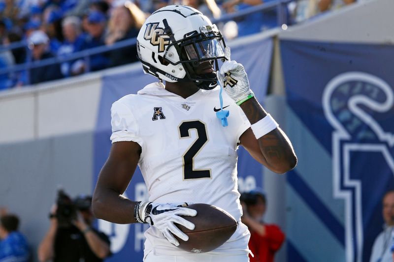 Nov 5, 2022; Memphis, Tennessee, USA; UCF Knights wide receiver Kobe Hudson (2) reacts after a touchdown catch during the first half against the Memphis Tigers  at Liberty Bowl Memorial Stadium. Mandatory Credit: Petre Thomas-USA TODAY Sports