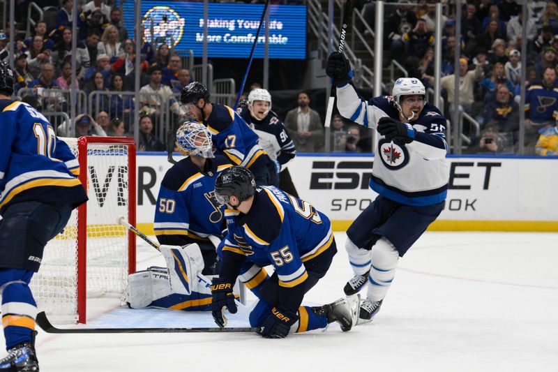 Apr 27, 2025; St. Louis, Missouri, USA; Winnipeg Jets center Mark Scheifele (55) reacts to a goal by Kyle Connor (81) against the St. Louis Blues during the first period in game four of the first round of the 2025 Stanley Cup Playoffs at Enterprise Center. Mandatory Credit: Jeff Le-Imagn Images