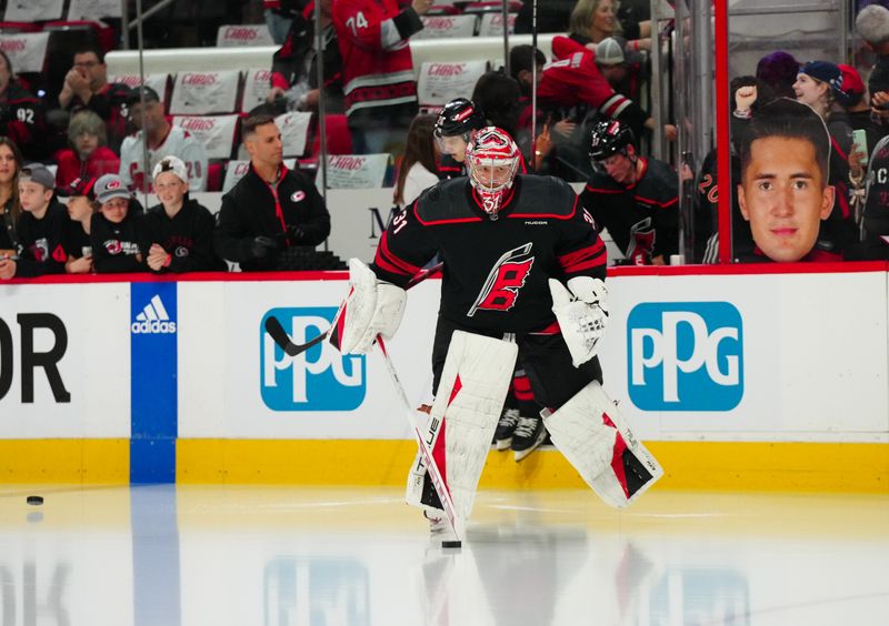 Apr 20, 2024; Raleigh, North Carolina, USA; Carolina Hurricanes goaltender Frederik Andersen (31) skates out onto the ice for the warmups before the game against the New York Islanders in game one of the first round of the 2024 Stanley Cup Playoffs at PNC Arena. Mandatory Credit: James Guillory-USA TODAY Sports