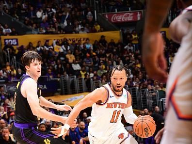 LOS ANGELES, CA - DECEMBER 18:  Jalen Brunson #11 of the New York Knicks goes to the basket during the game on December 18, 2023 at Crypto.Com Arena in Los Angeles, California. NOTE TO USER: User expressly acknowledges and agrees that, by downloading and/or using this Photograph, user is consenting to the terms and conditions of the Getty Images License Agreement. Mandatory Copyright Notice: Copyright 2023 NBAE (Photo by Adam Pantozzi/NBAE via Getty Images)