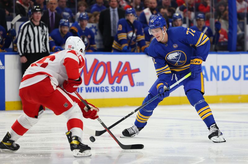 Dec 5, 2023; Buffalo, New York, USA;  Buffalo Sabres right wing Tage Thompson (72) skates with the puck as Detroit Red Wings defenseman Jake Walman (96) looks to defend during the second period at KeyBank Center. Mandatory Credit: Timothy T. Ludwig-USA TODAY Sports