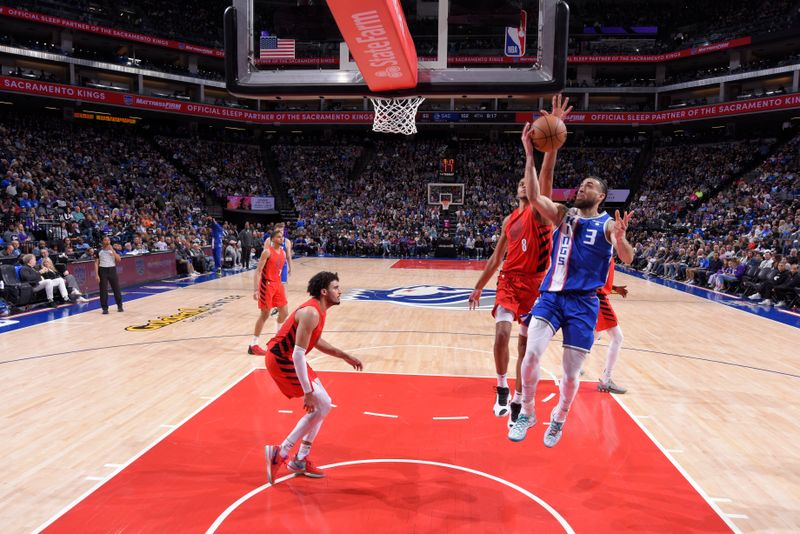 SACRAMENTO, CA - APRIL 14:  Chris Duarte #3 of the Sacramento Kings goes to the basket during the game on April 14, 2024 at Golden 1 Center in Sacramento, California. NOTE TO USER: User expressly acknowledges and agrees that, by downloading and or using this Photograph, user is consenting to the terms and conditions of the Getty Images License Agreement. Mandatory Copyright Notice: Copyright 2024 NBAE (Photo by Rocky Widner/NBAE via Getty Images)