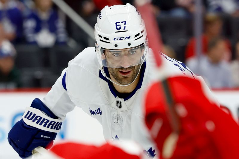 Oct 3, 2024; Detroit, Michigan, USA;  Toronto Maple Leafs left wing Max Pacioretty (67) gets set during a face off in the first period against the Detroit Red Wings at Little Caesars Arena. Mandatory Credit: Rick Osentoski-Imagn Images