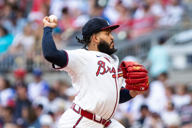 Sep 29, 2024; Cumberland, Georgia, USA; Atlanta Braves pitcher Daysbel Hernández (62) pitches the ball against the Kansas City Royals during the seventh inning at Truist Park. Mandatory Credit: Jordan Godfree-Imagn Images