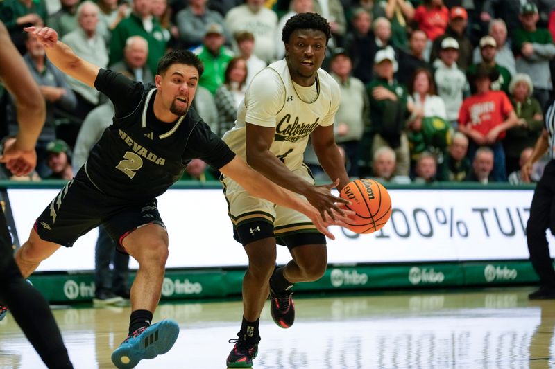 Feb 27, 2024; Fort Collins, Colorado, USA; Nevada Wolf Pack guard Jarod Lucas (2) fights for the ball with Colorado State Rams guard Isaiah Stevens (4) during the second half at Moby Arena. Mandatory Credit: Michael Madrid-USA TODAY Sports