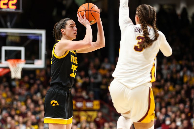 Feb 28, 2024; Minneapolis, Minnesota, USA; Iowa Hawkeyes guard Caitlin Clark (22) shoots as Minnesota Golden Gophers guard Amaya Battle (3) defends during the second half at Williams Arena. Mandatory Credit: Matt Krohn-USA TODAY Sports